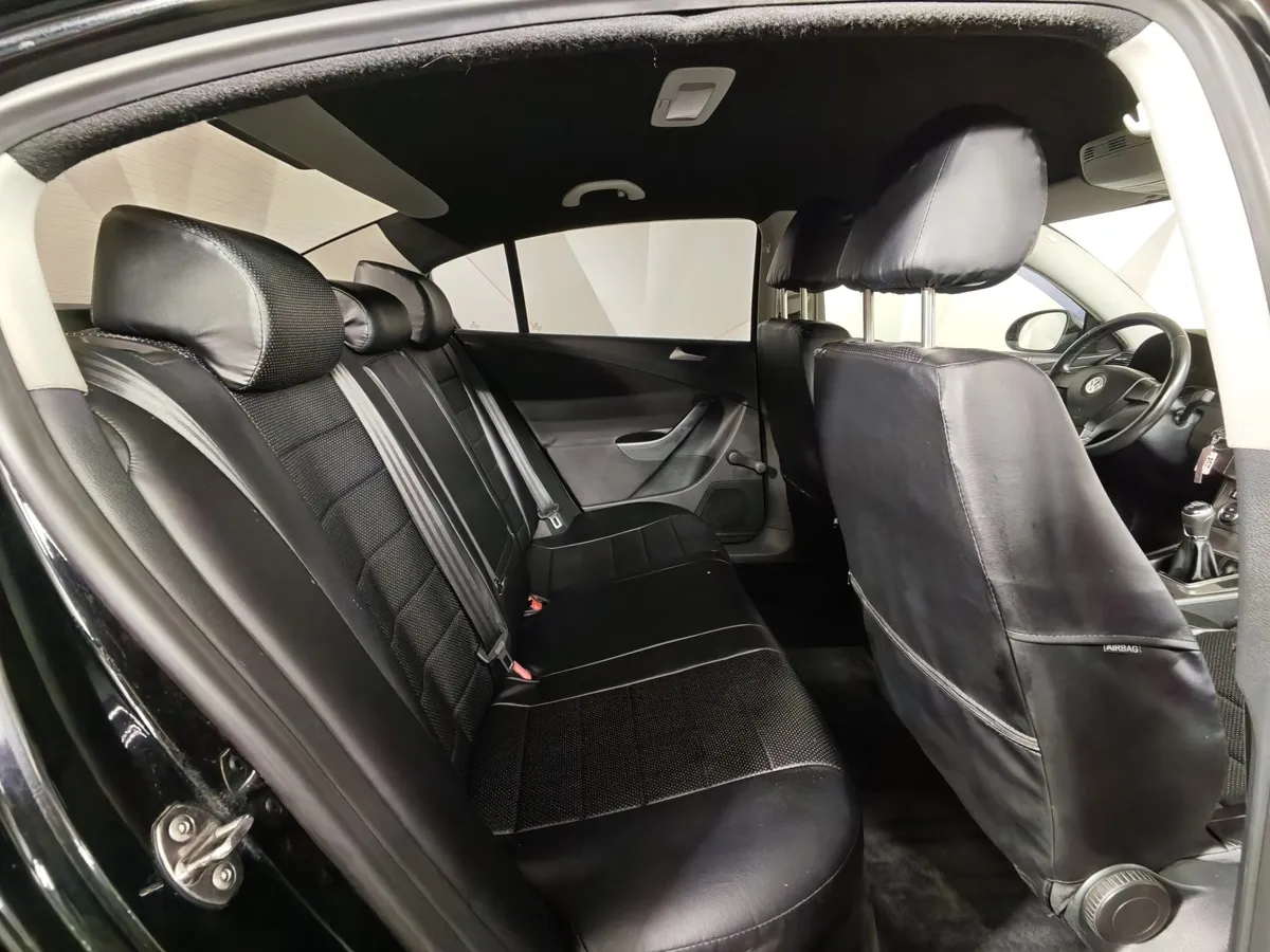 Volkswagen Passat 1.6 MPI MT (102 л.с.) Черный в АВИЛОН. Слайд №15