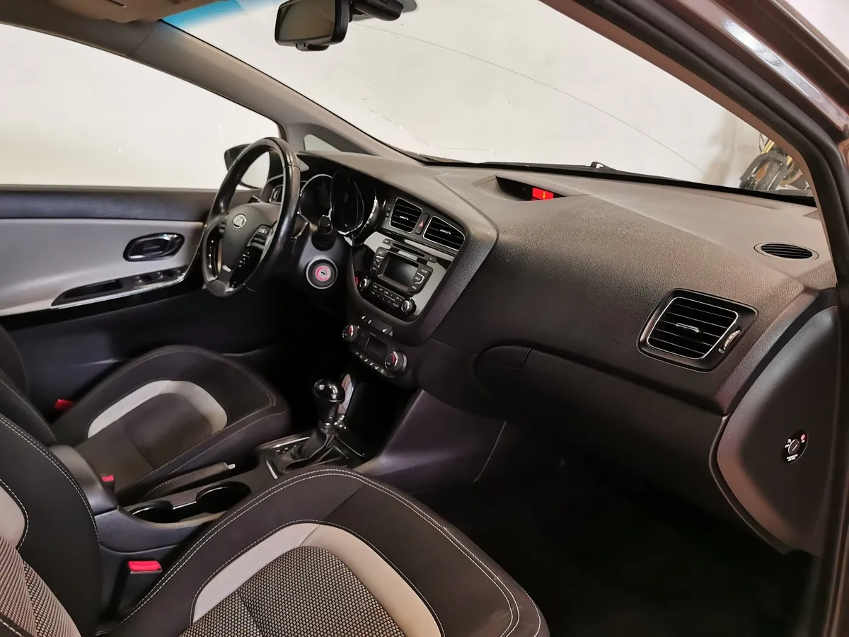 Kia Ceed 1.6 AT (129 л.с.) Коричневый в АВИЛОН. Слайд №12
