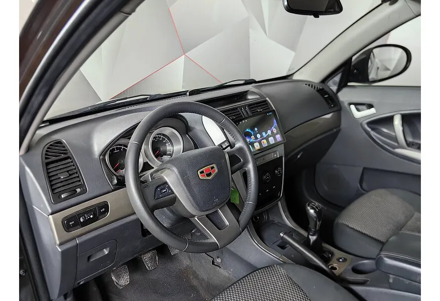 Geely Emgrand X7 2.0 MT (139 л.с.) Коричневый в АВИЛОН. Слайд №14