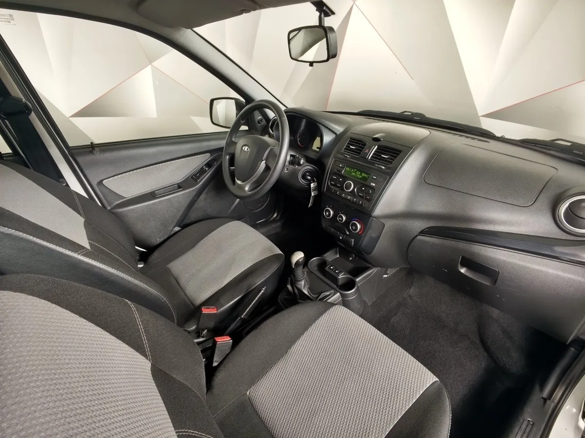 ВАЗ (Lada) Kalina 1.6 MT (87 л.с.) Белый в АВИЛОН. Слайд №11