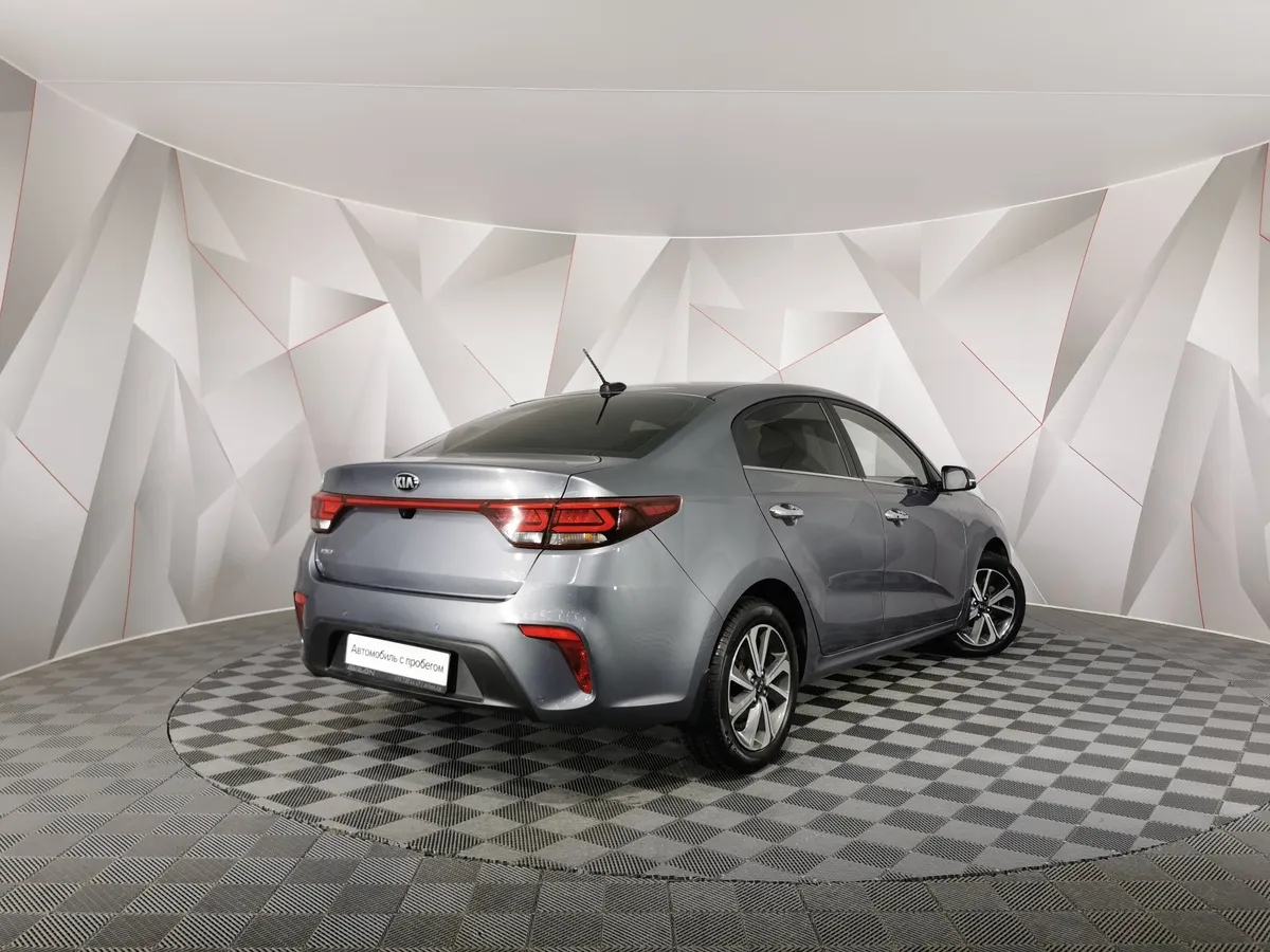 Kia Rio 1.6 AT (123 л.с.) Premium Серый в АВИЛОН. Слайд №2