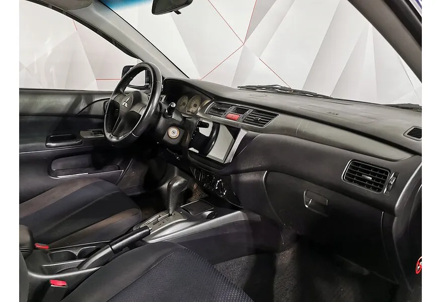 Mitsubishi Lancer 1.6 AT (98 л.с.) Синий в АВИЛОН. Слайд №9