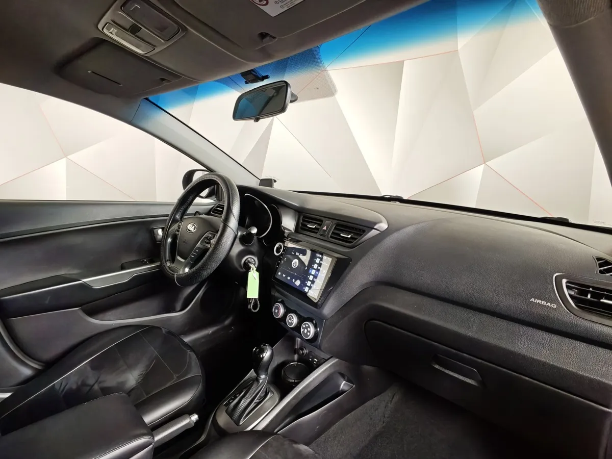Kia Rio 1.6 AT (123 л.с.) Серый в АВИЛОН. Слайд №13