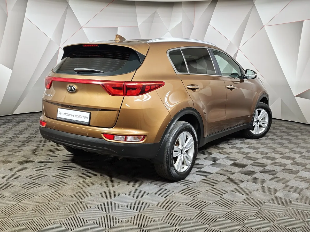 Kia Sportage 2.0 MPI AT 4WD (150 л.с.) Comfort Коричневый в АВИЛОН. Слайд №2