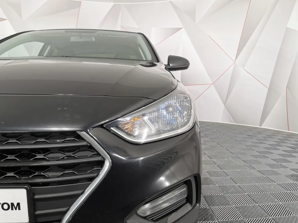 Hyundai Solaris 1.6 MT (123 л.с.) Comfort Черный в АВИЛОН. Слайд №10