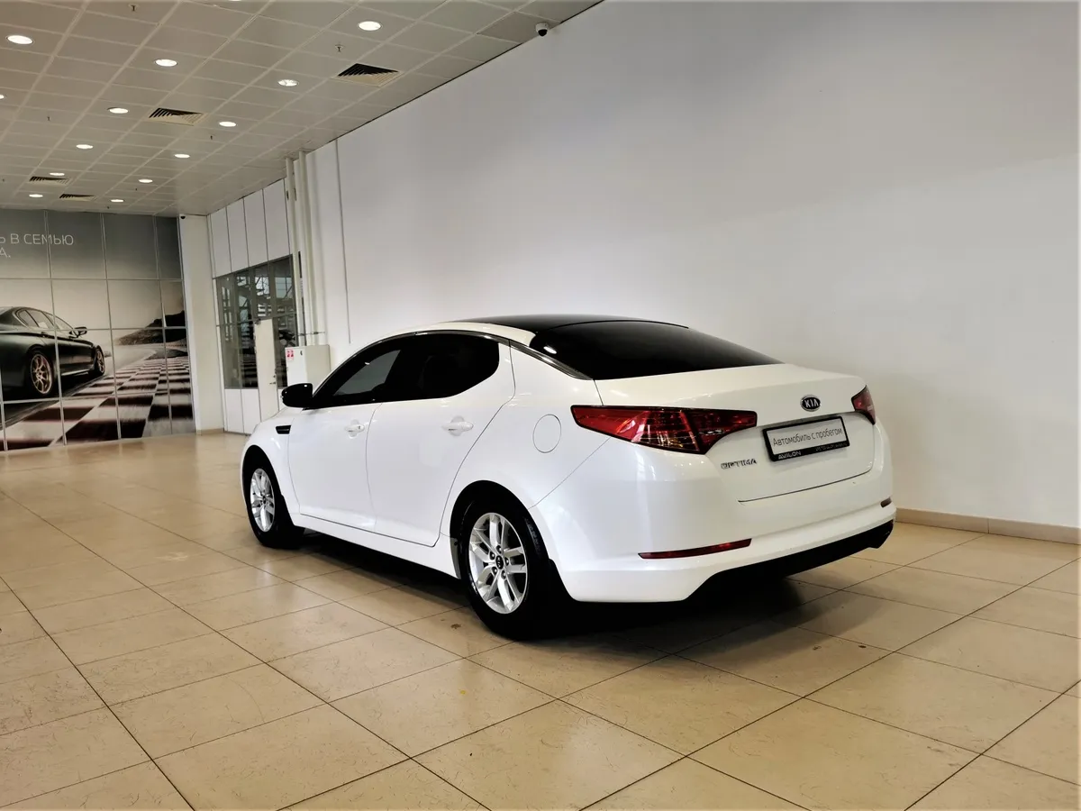 Kia Optima 2.0 AT (150 л.с.) Comfort Белый в АВИЛОН. Слайд №4