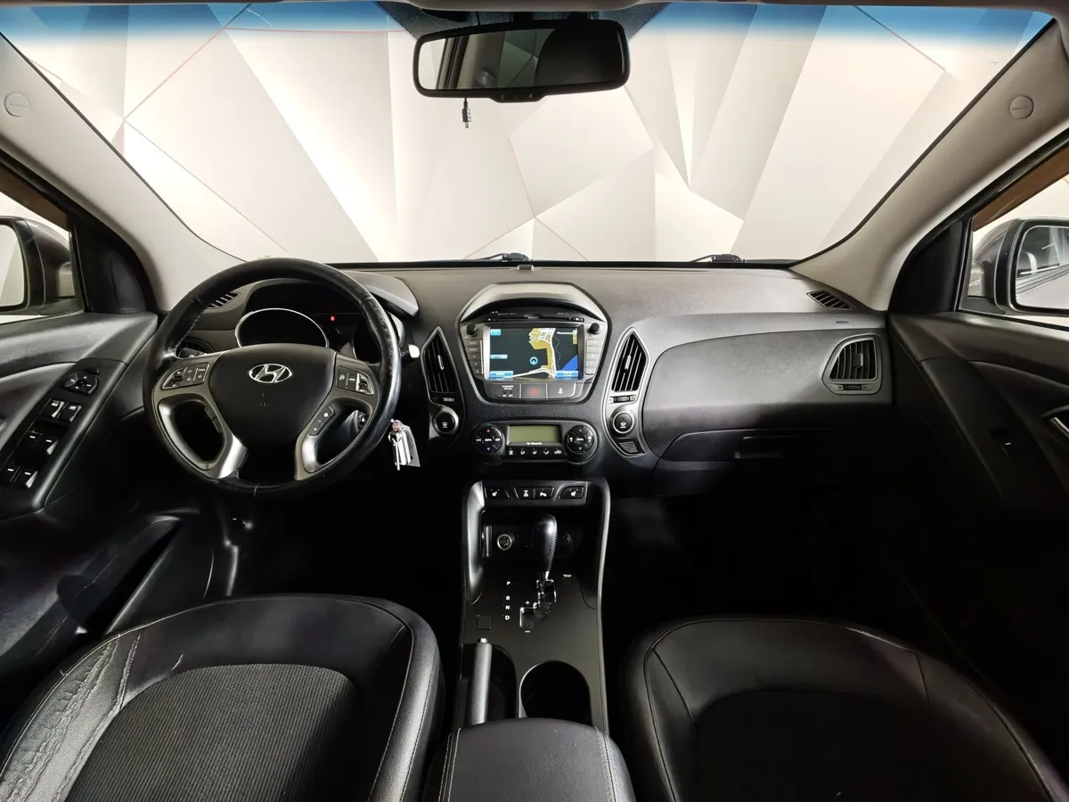 Hyundai ix35 2.0 AT 4WD (150 л.с.) Travel Коричневый в АВИЛОН. Слайд №14