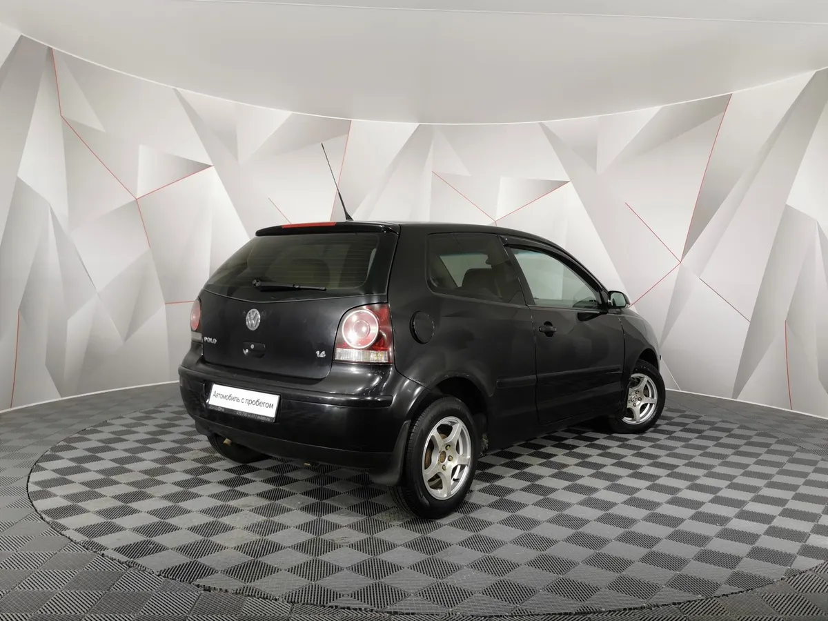 Volkswagen Polo 1.4 AT (75 л.с.) Черный в АВИЛОН. Слайд №2