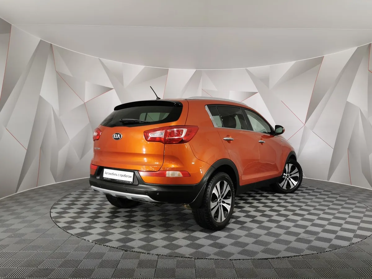 Kia Sportage 2.0 AT 4WD (150 л.с.) Luxe Оранжевый в АВИЛОН. Слайд №2
