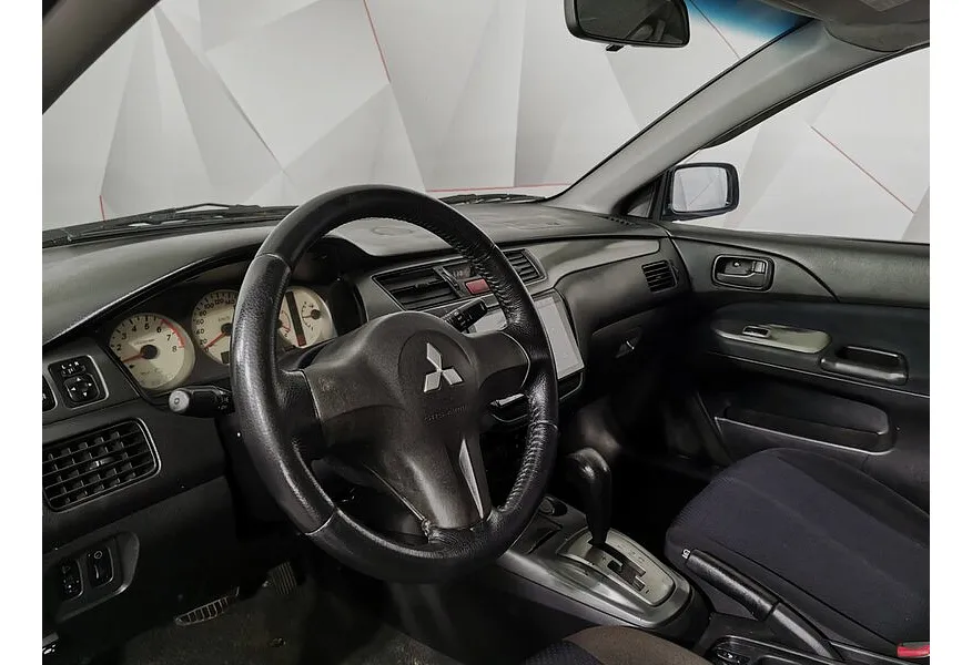 Mitsubishi Lancer 1.6 AT (98 л.с.) Синий в АВИЛОН. Слайд №14
