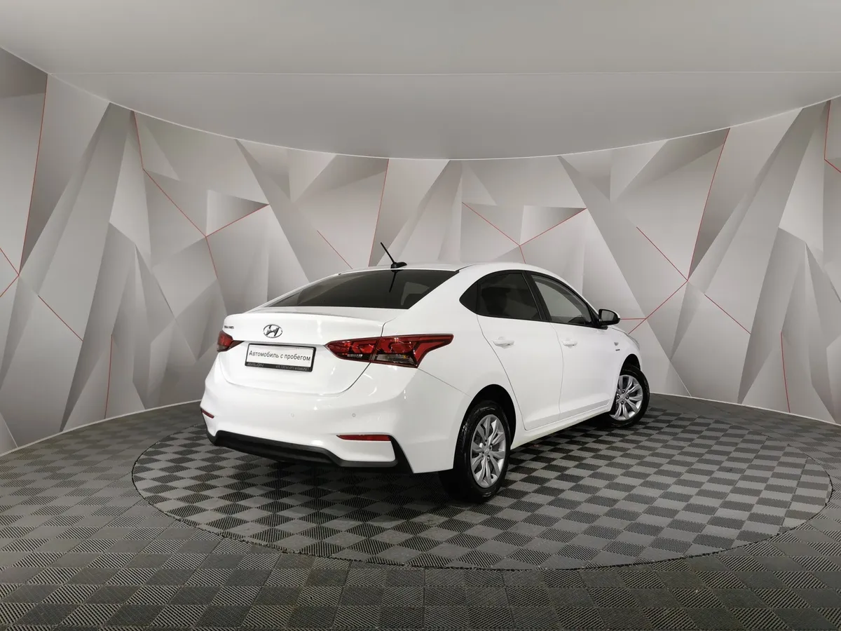 Hyundai Solaris 1.6 AT (123 л.с.) Super Series Белый в АВИЛОН. Слайд №2