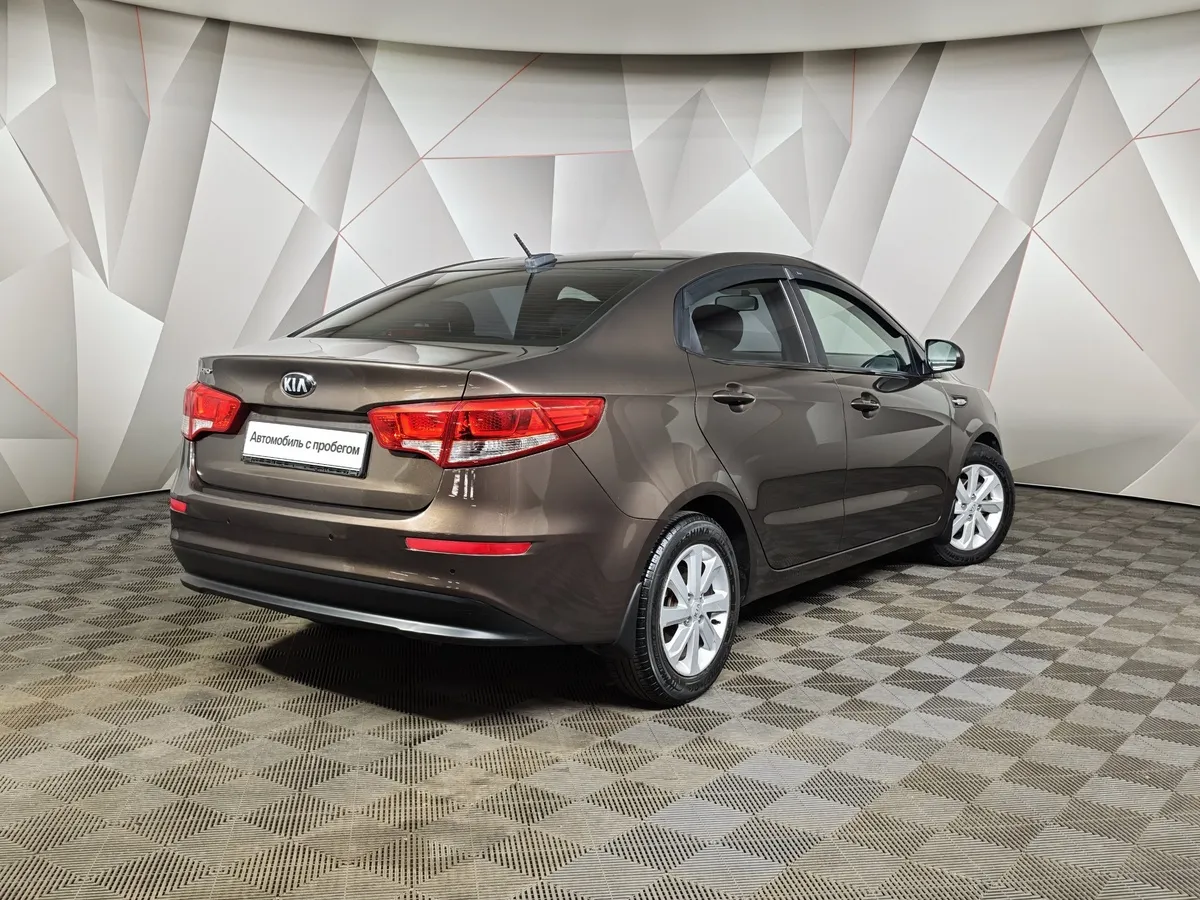 Kia Rio 1.6 AT (123 л.с.) Коричневый в АВИЛОН. Слайд №2