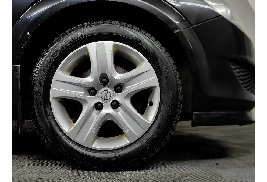 Opel Astra 1.8 AT (140 л.с.) Черный в АВИЛОН. Слайд №9