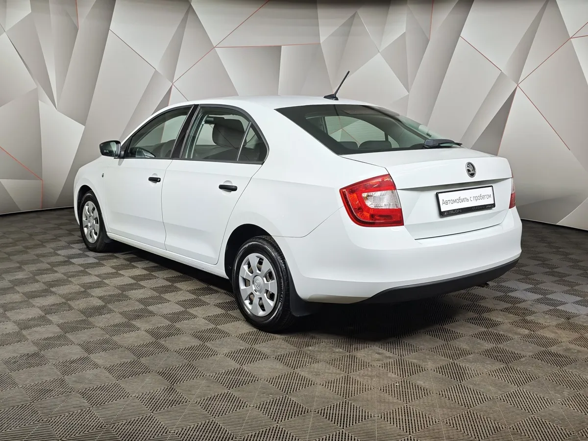 Skoda Rapid 1.6 MT (90 л.с.) Белый в АВИЛОН. Слайд №4