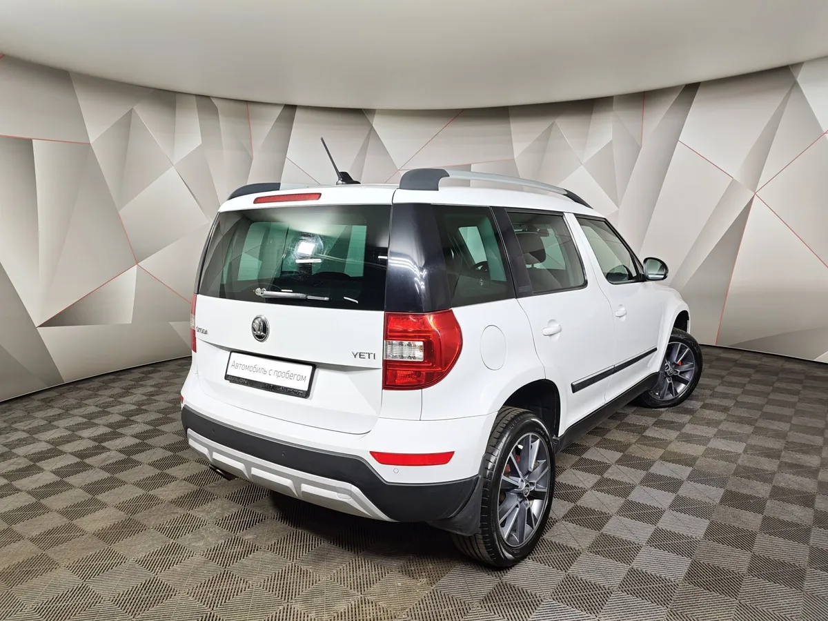 Skoda Yeti 1.8 TSI 4x4 DSG (152 л.с.) Белый в АВИЛОН. Слайд №2