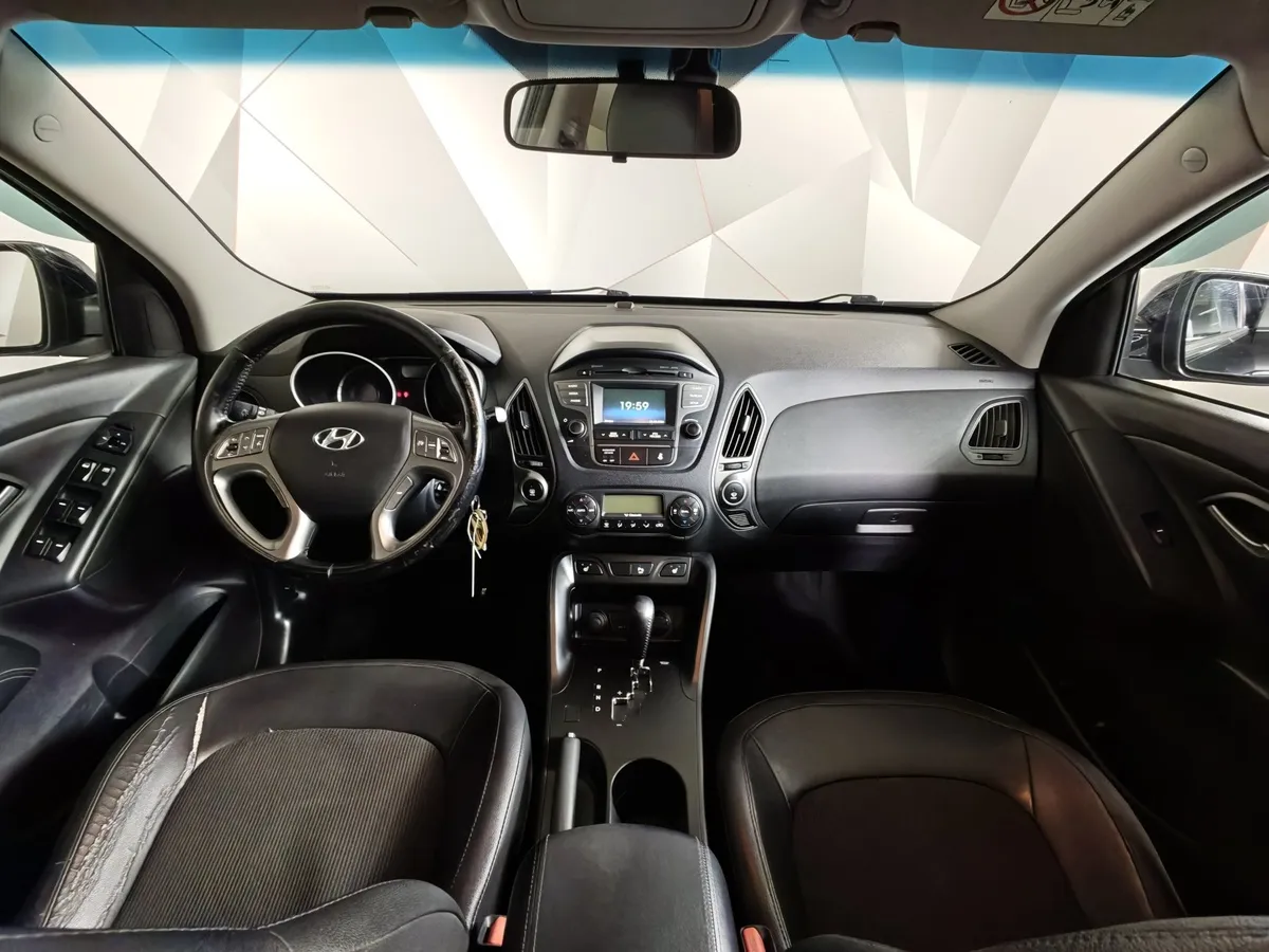 Hyundai ix35 2.0 AT 4WD (150 л.с.) Comfort Черный в АВИЛОН. Слайд №14