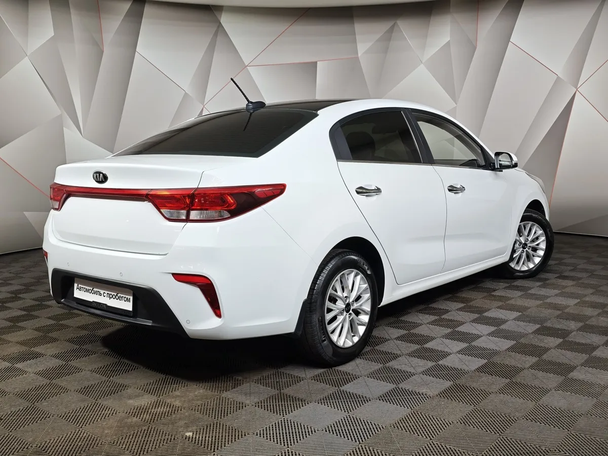 Kia Rio 1.6 AT (123 л.с.) Белый в АВИЛОН. Слайд №2