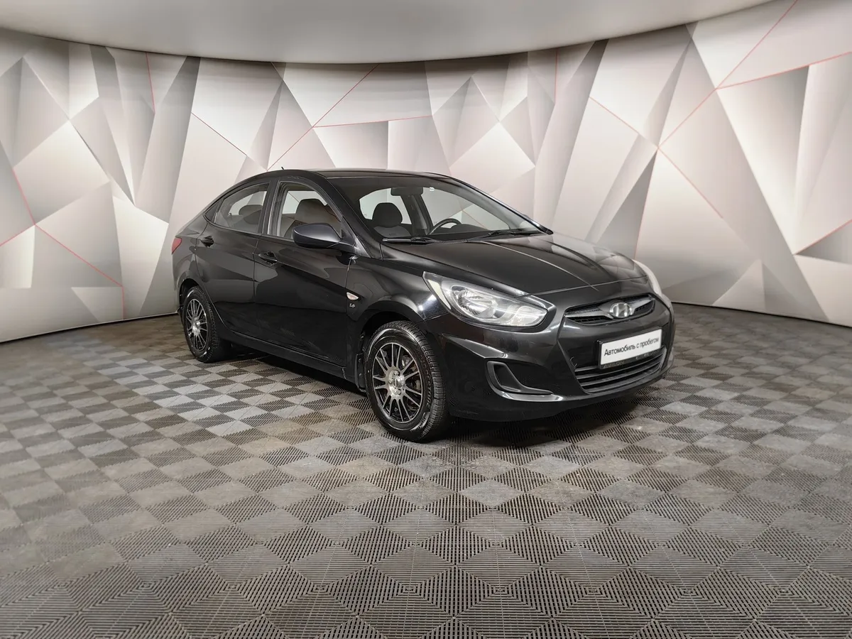Hyundai Solaris 1.6 MT (123 л.с.) Optima Черный в АВИЛОН. Слайд №3