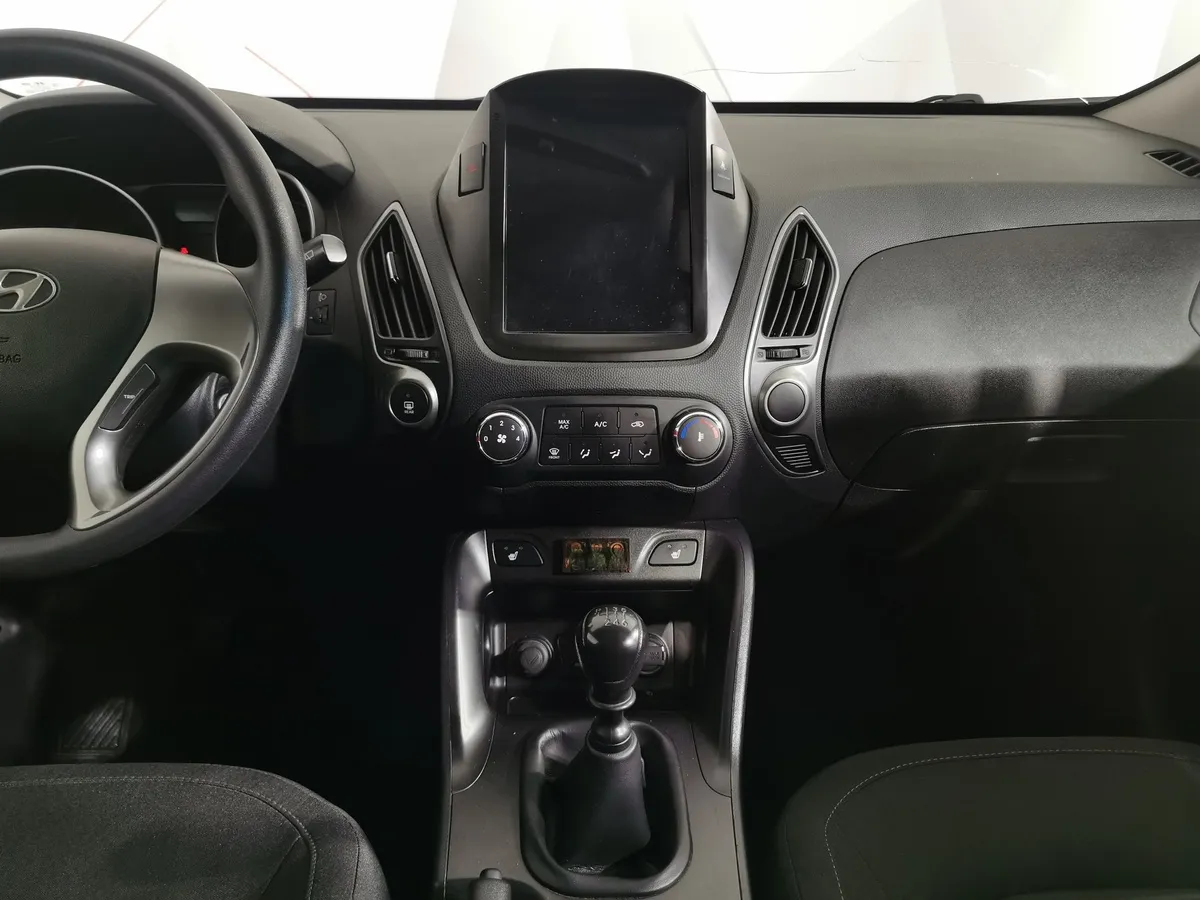 Hyundai ix35 2.0 MT 2WD (150 л.с.) Коричневый в АВИЛОН. Слайд №14