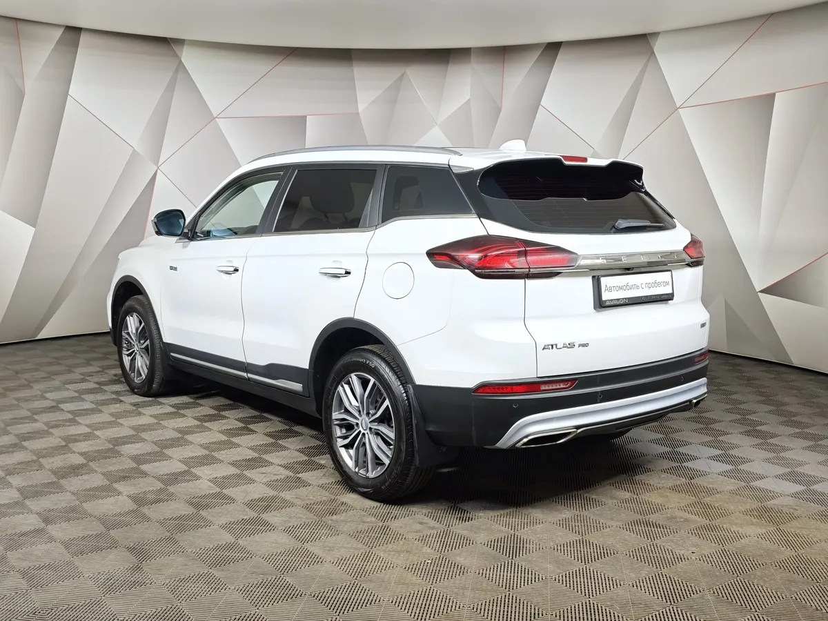 Geely Atlas Pro 1.5T 7DCT AWD (177 л.с.) Flagship Белый в АВИЛОН. Слайд №4