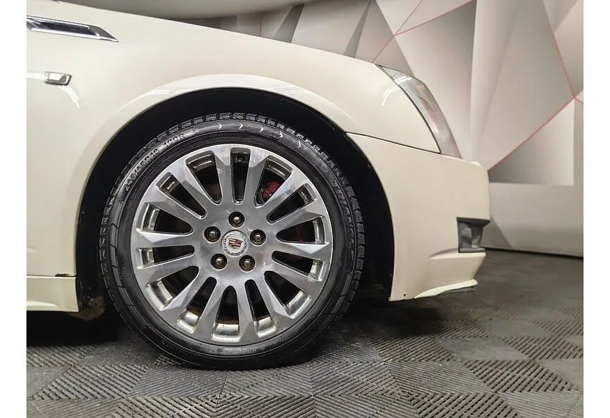 Cadillac CTS 3.6 V6 SIDI AWD (311 л.с.) Белый в АВИЛОН. Слайд №9