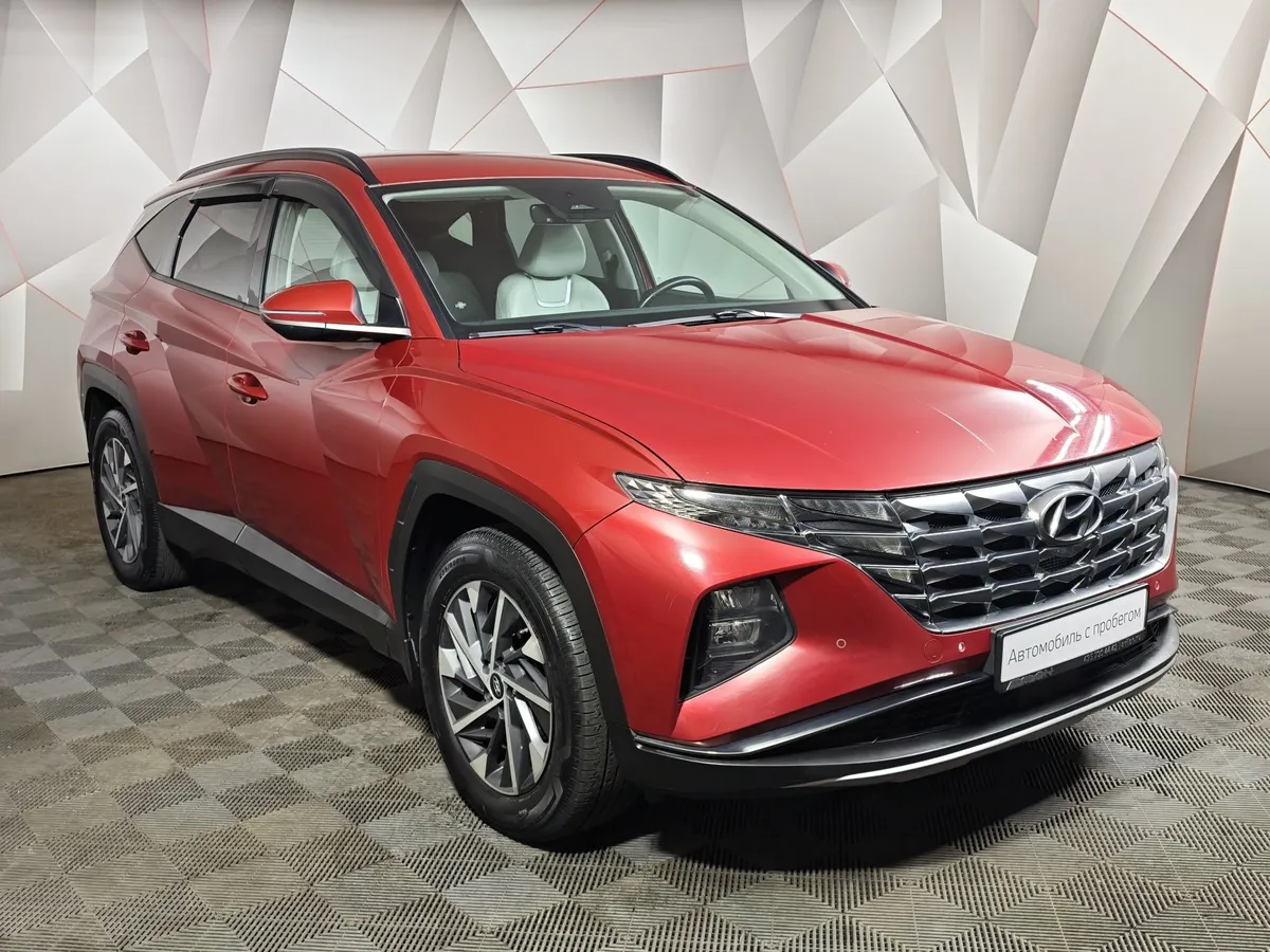 Hyundai Tucson 2.0 AT 4WD (142 л.с.) Красный в АВИЛОН. Слайд №3