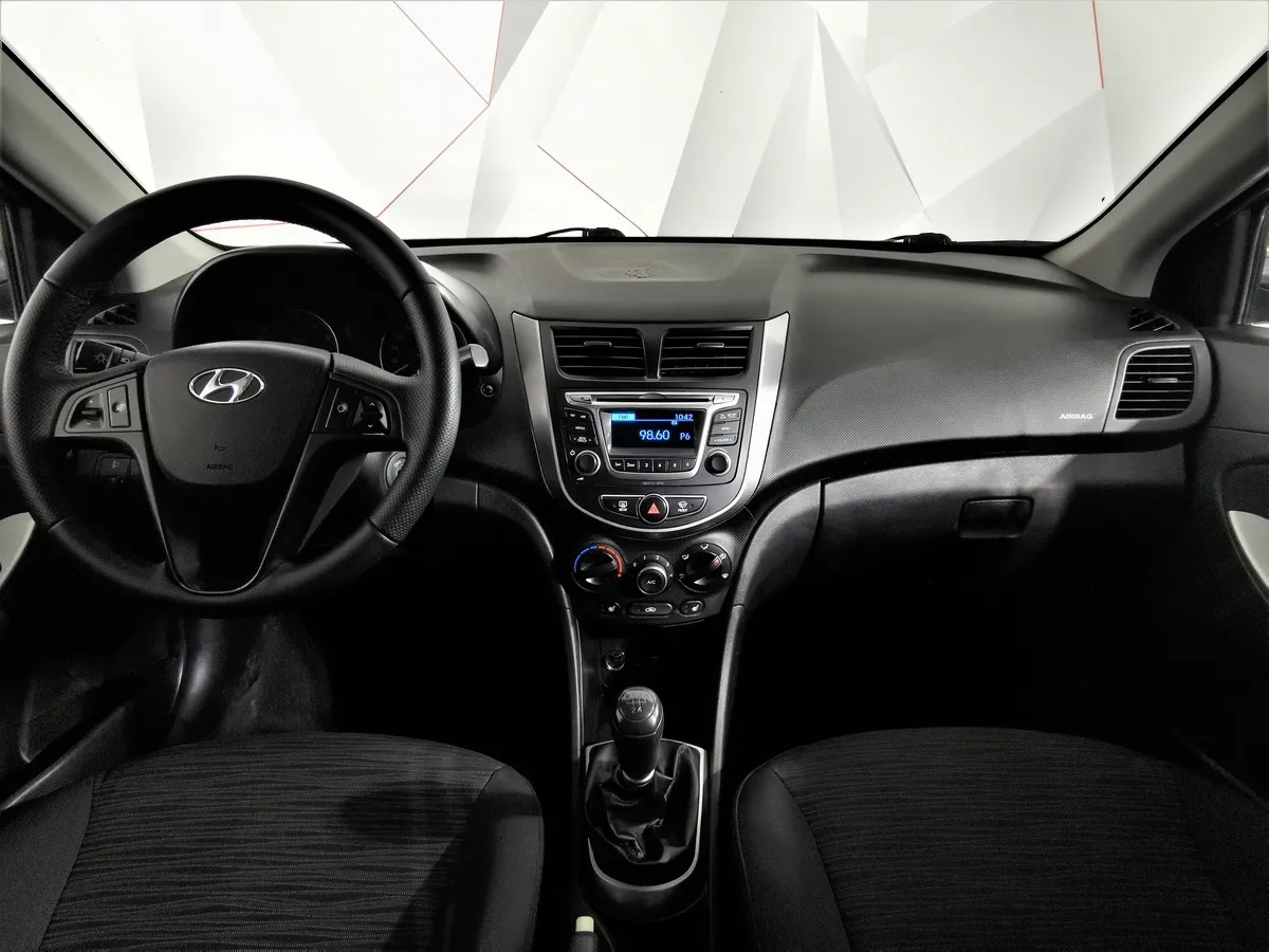 Hyundai Solaris 1.4 MT (107 л.с.) Active Коричневый в АВИЛОН. Слайд №12
