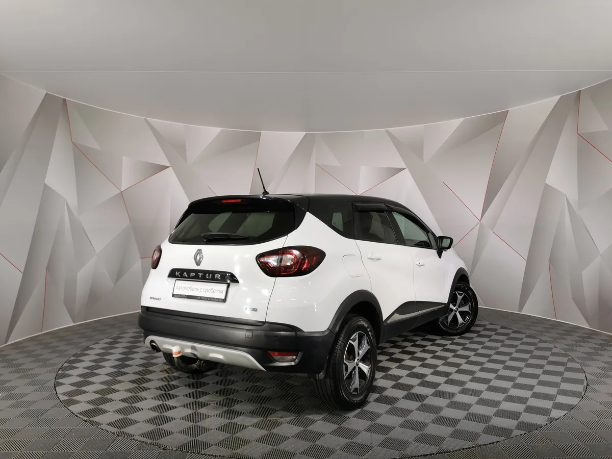 Renault Kaptur 2.0 MT AWD (143 л.с.) Drive Белый в АВИЛОН. Слайд №2