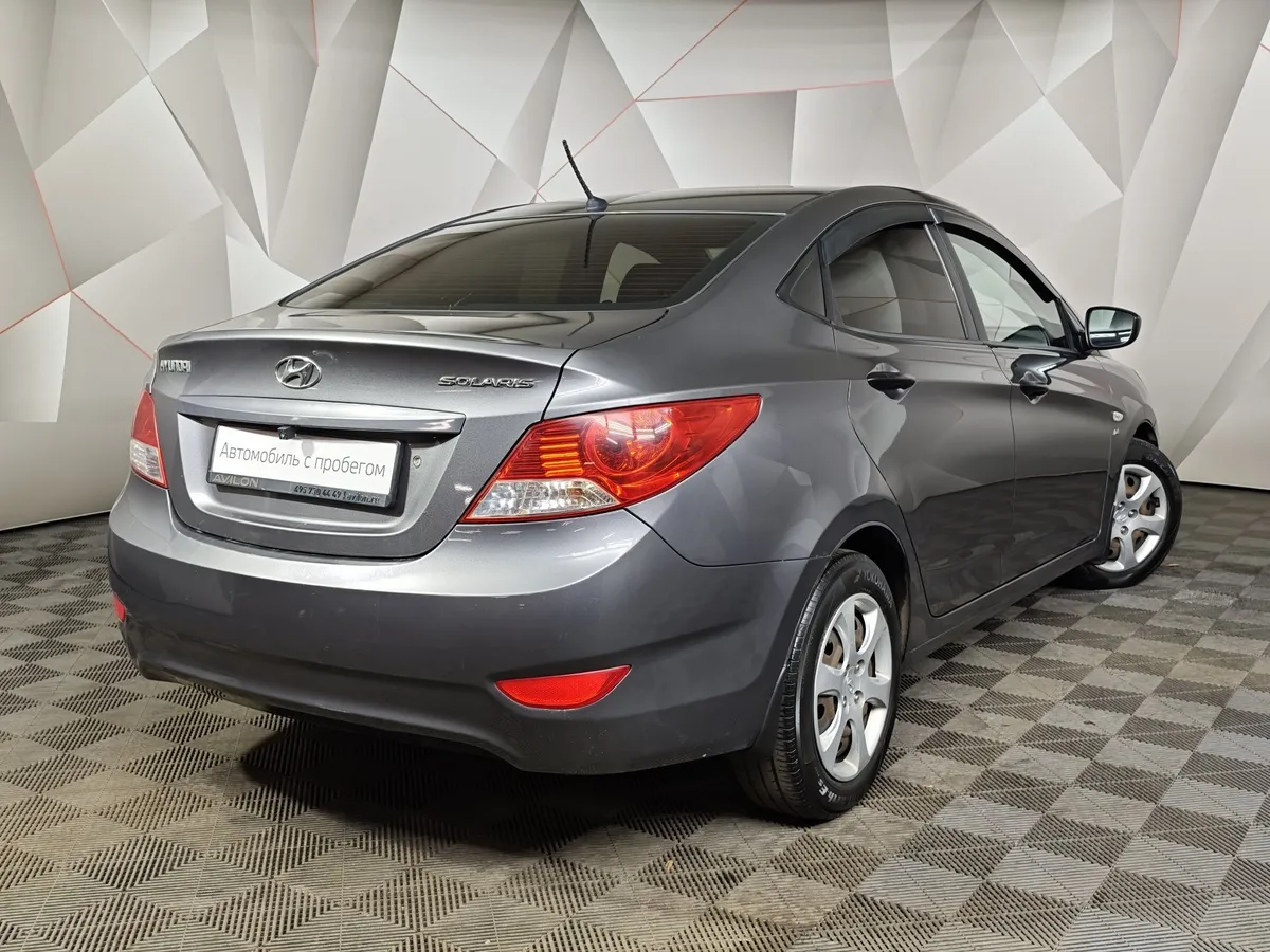 Hyundai Solaris 1.4 MT (100 л.с.) Active Plus Серый в АВИЛОН. Слайд №2