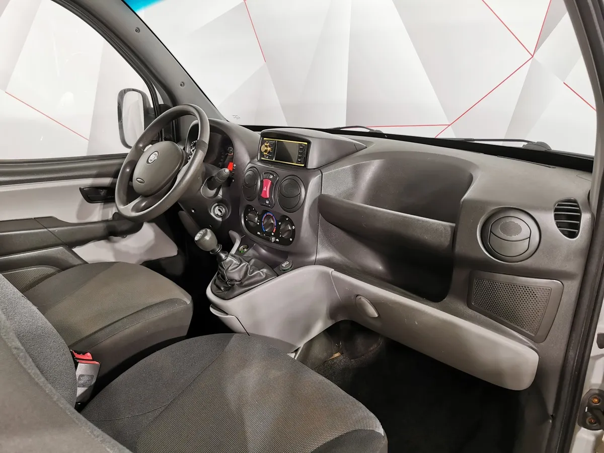 Fiat Doblo 1.4 MT FWD (78 л.с.) Серый в АВИЛОН. Слайд №11