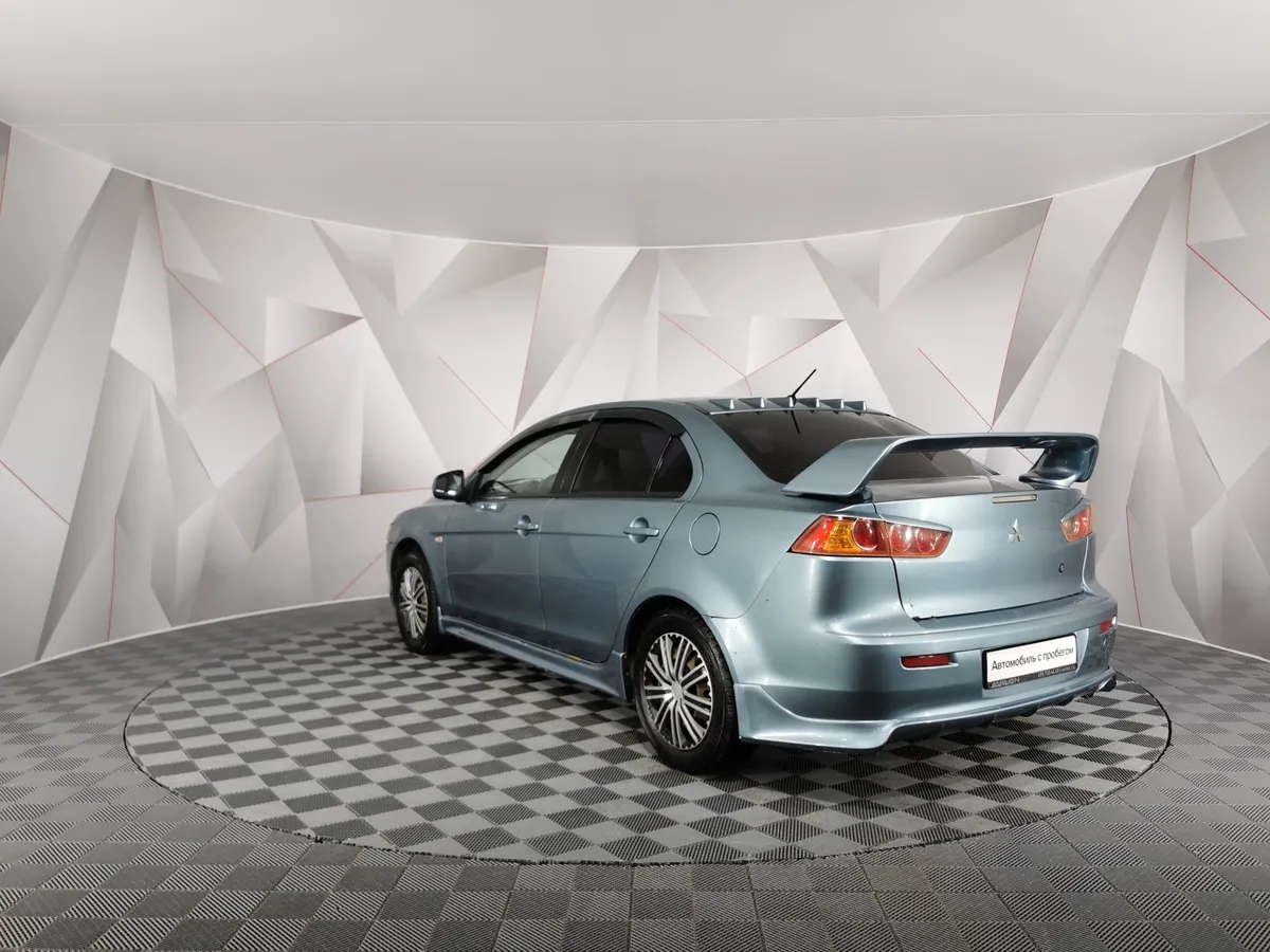 Mitsubishi Lancer 1.6 AT (117 л.с.) Зеленый в АВИЛОН. Слайд №4