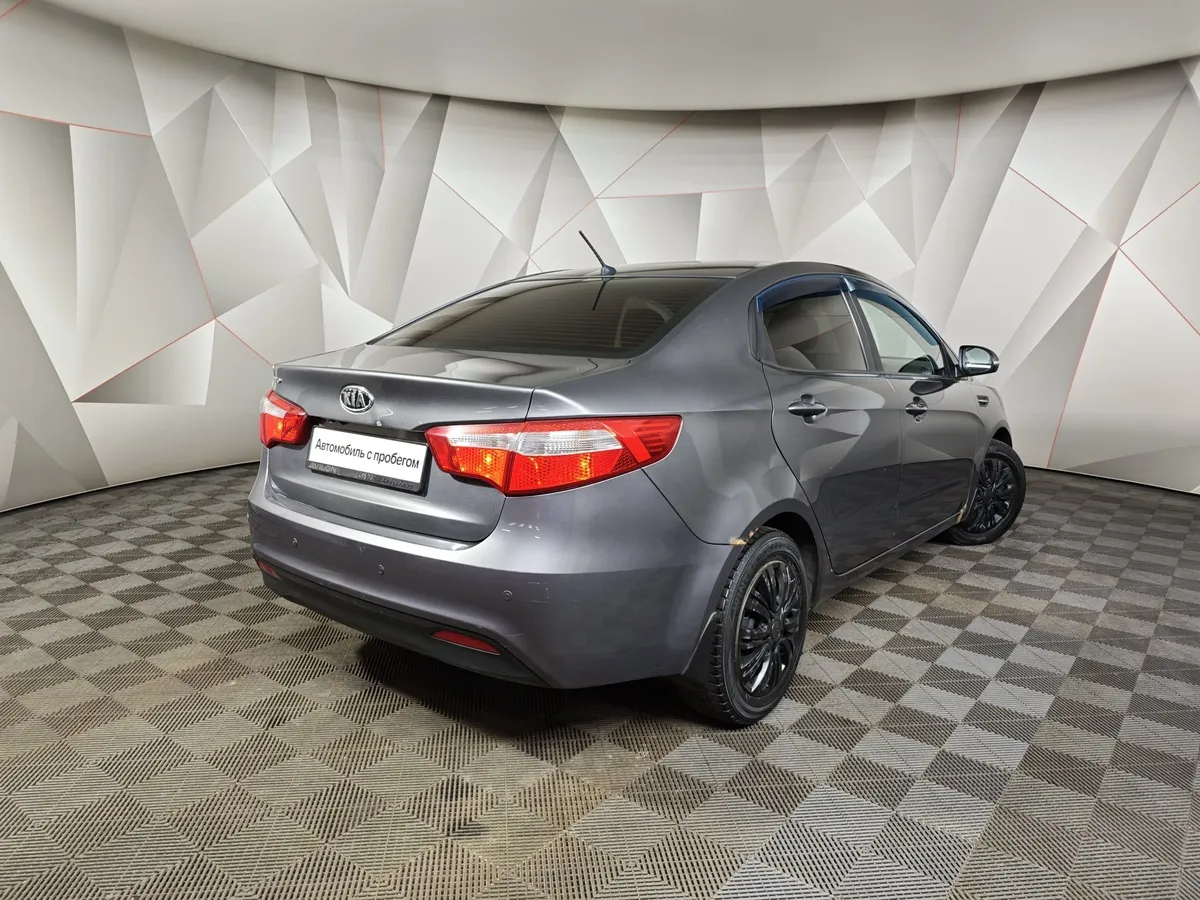 Kia Rio 1.6 AT (123 л.с.) Серый в АВИЛОН. Слайд №2