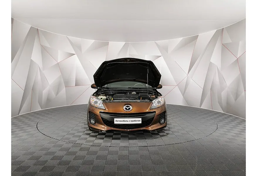 Mazda 3 1.6 AT (105 л.с.) Коричневый в АВИЛОН. Слайд №11