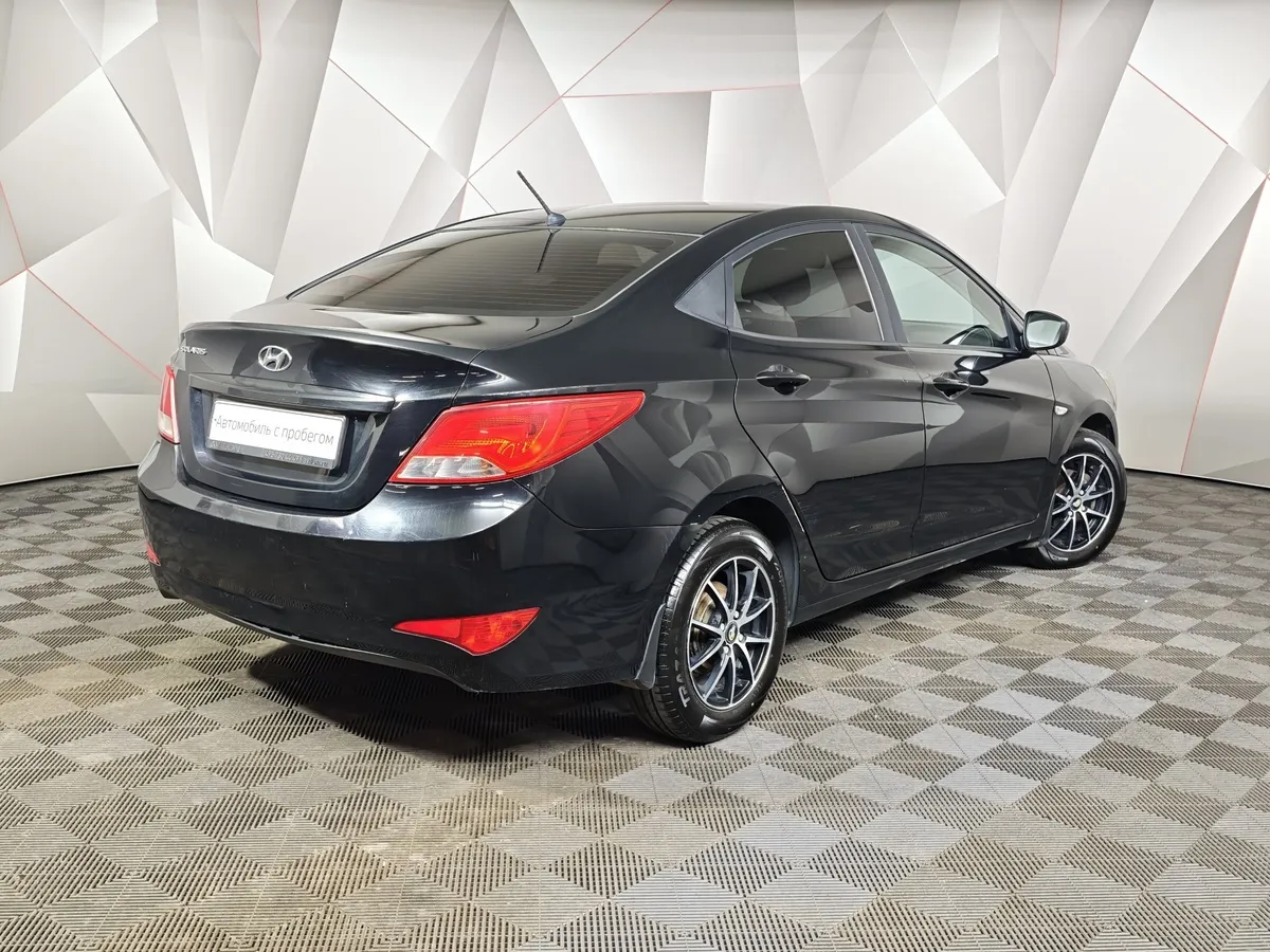 Hyundai Solaris 1.6 AT (123 л.с.) Classic Черный в АВИЛОН. Слайд №2