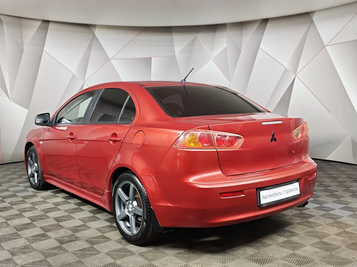 Mitsubishi Lancer 1.8 CVT (143 л.с.) Красный в АВИЛОН. Слайд №4