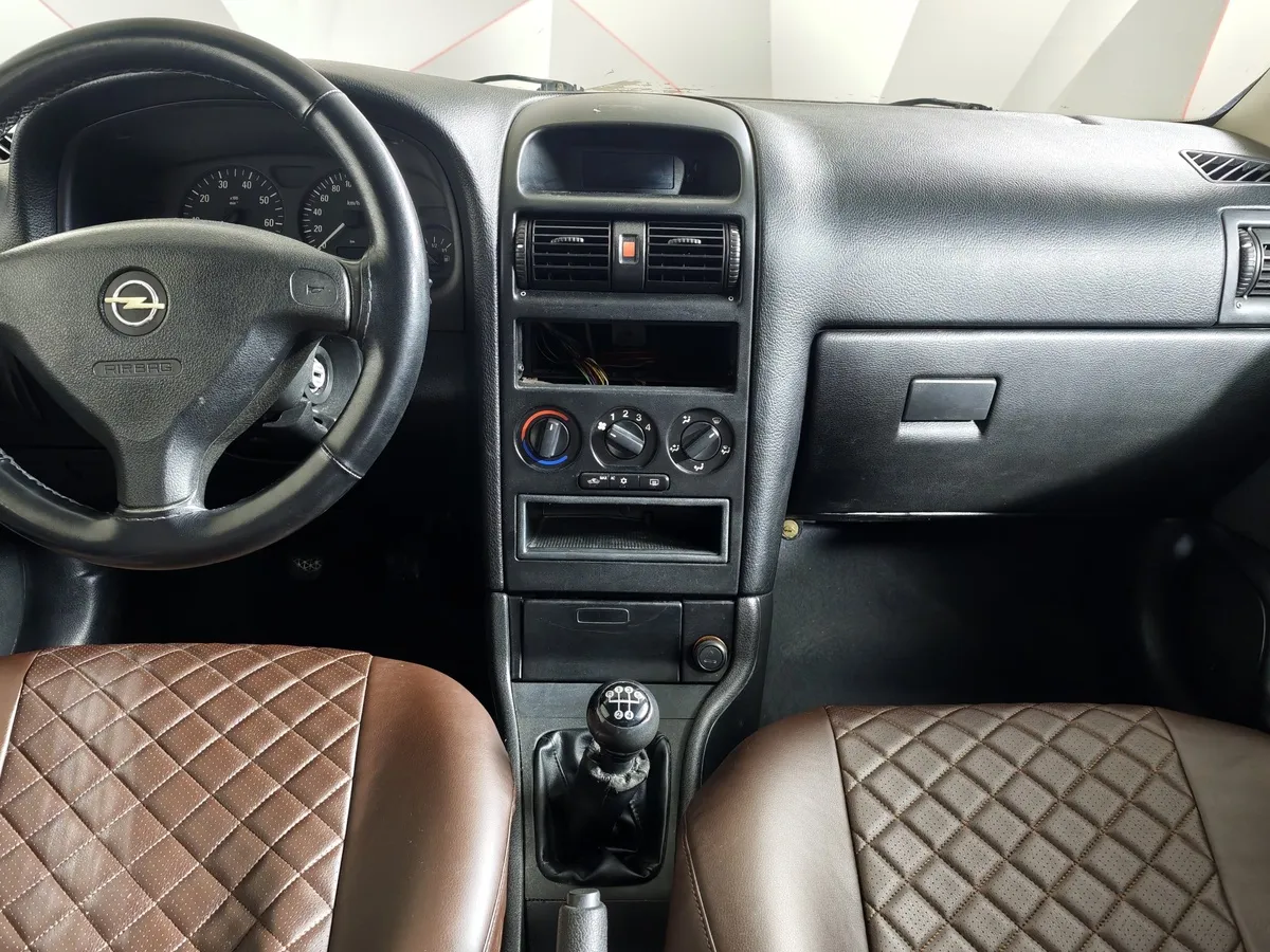 Opel Astra 1.6 Easytronic (115 л.с.) base в АВИЛОН. Слайд №14