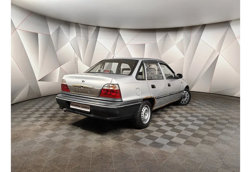 Daewoo Nexia 1.5 MT (75 л.с.) Серебристый в АВИЛОН. Слайд №2