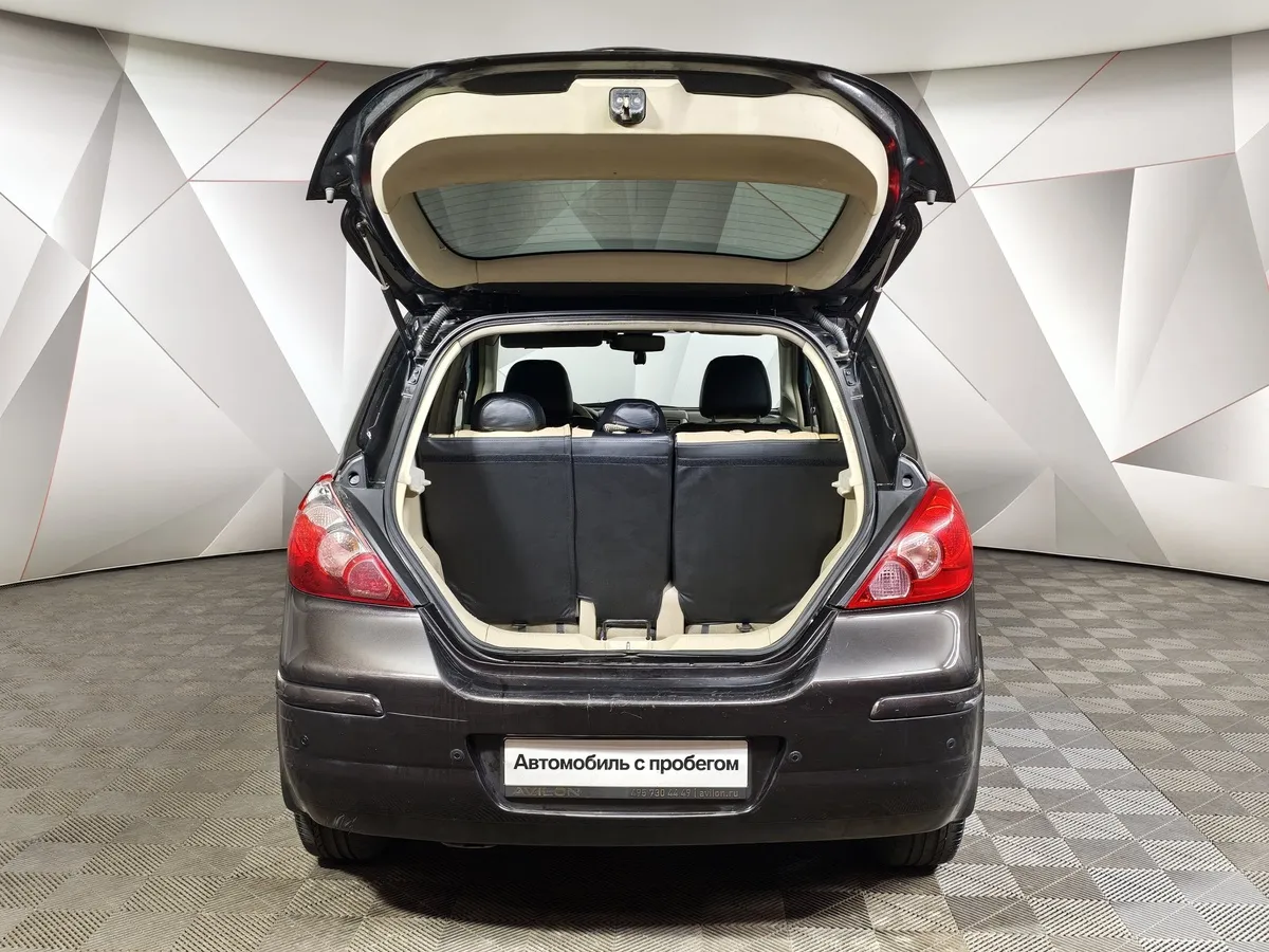 Nissan Tiida 1.6 AT (110 л.с.) Черный в АВИЛОН. Слайд №11