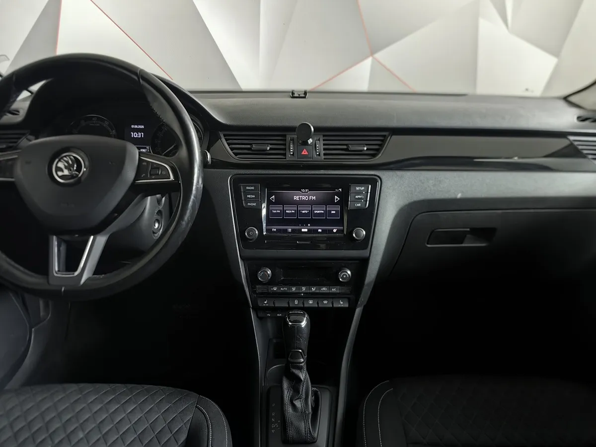 Skoda Rapid 1.6 AT (110 л.с.) Белый в АВИЛОН. Слайд №15
