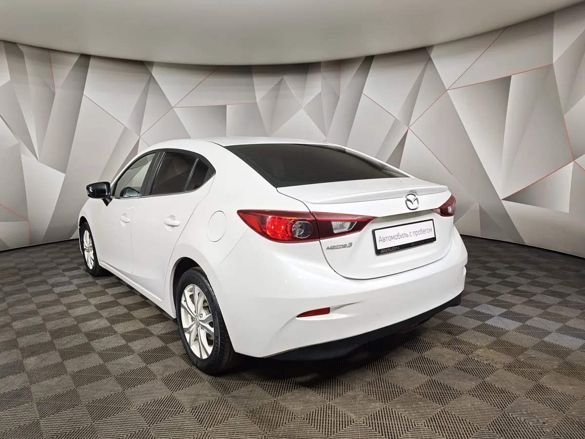Mazda 3 1.6 MT (104 л.с.) Белый в АВИЛОН. Слайд №4