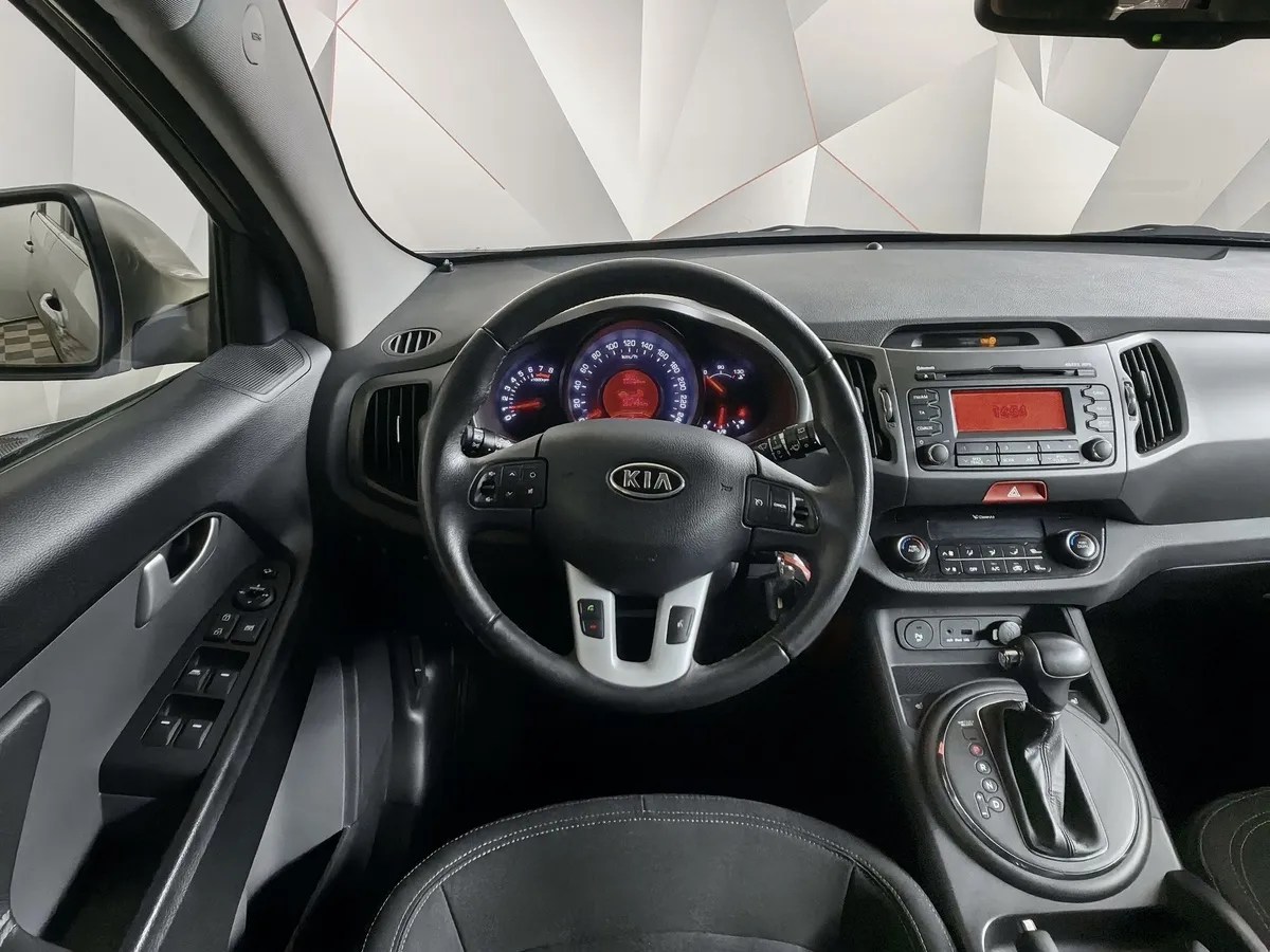 Kia Sportage 2.0 AT (150 л.с.) Серебристый в АВИЛОН. Слайд №19