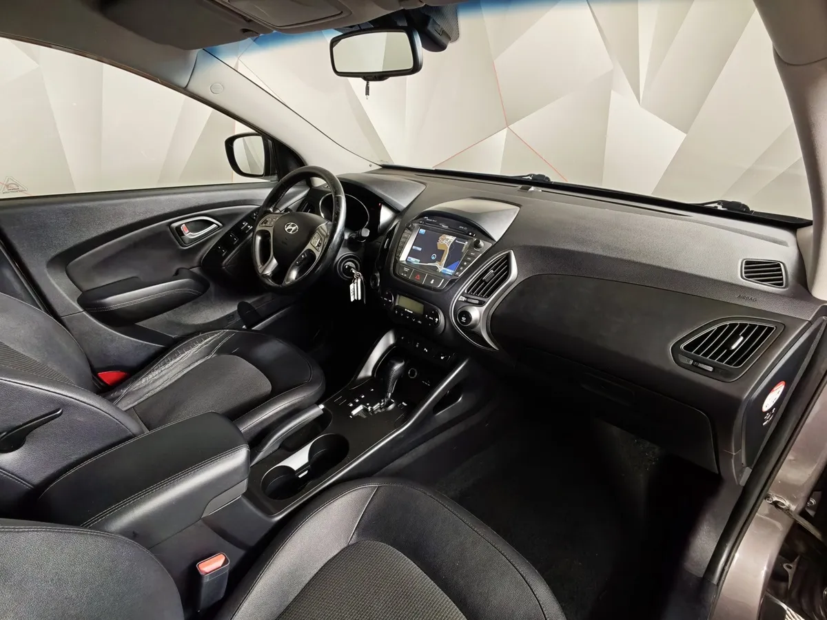 Hyundai ix35 2.0 AT 4WD (150 л.с.) Travel Коричневый в АВИЛОН. Слайд №13