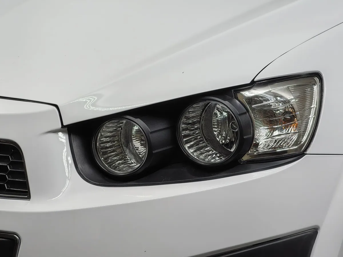 Chevrolet Aveo 1.6 AT (115 л.с.) Белый в АВИЛОН. Слайд №10