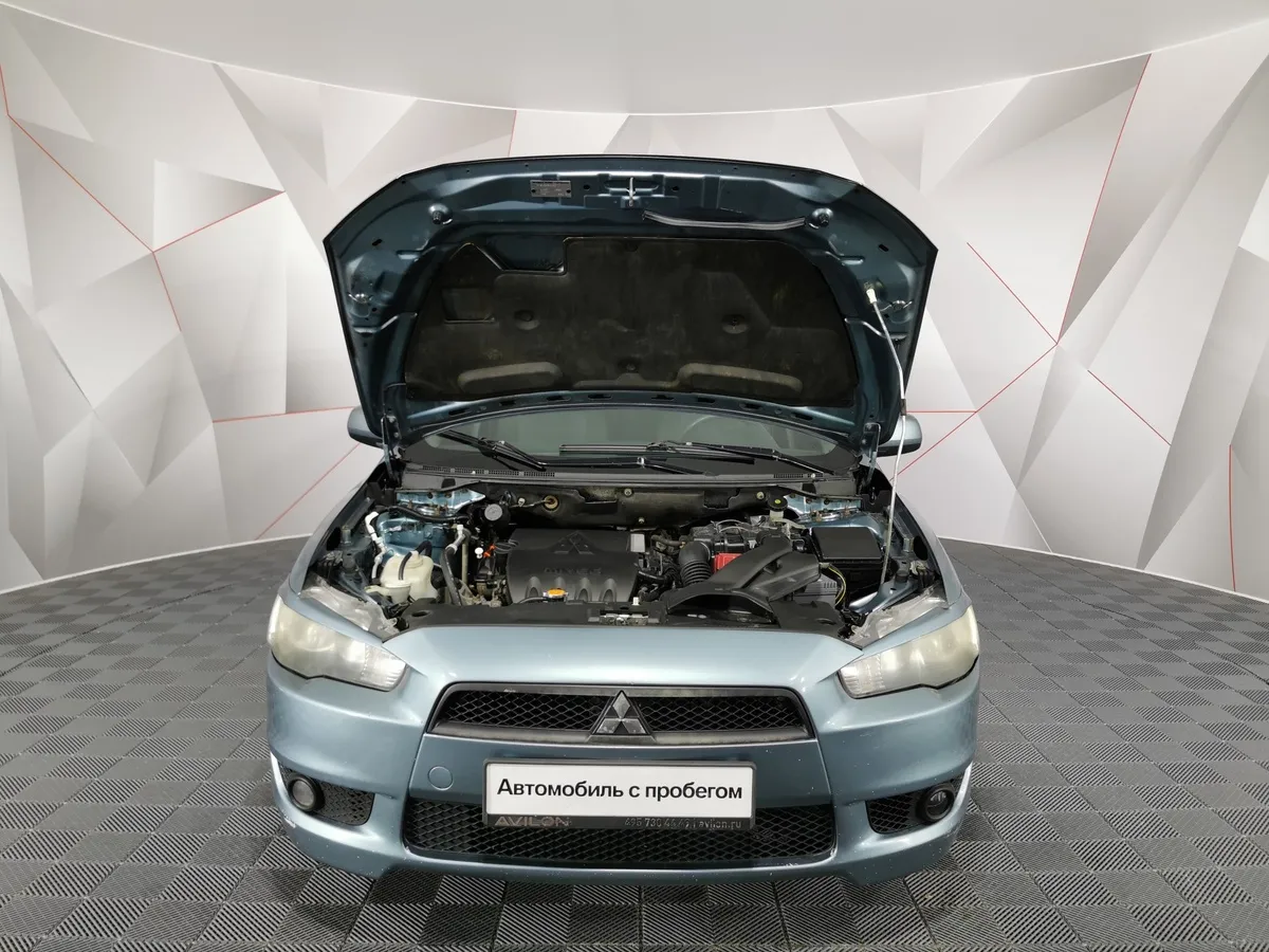 Mitsubishi Lancer 1.6 AT (117 л.с.) Зеленый в АВИЛОН. Слайд №11
