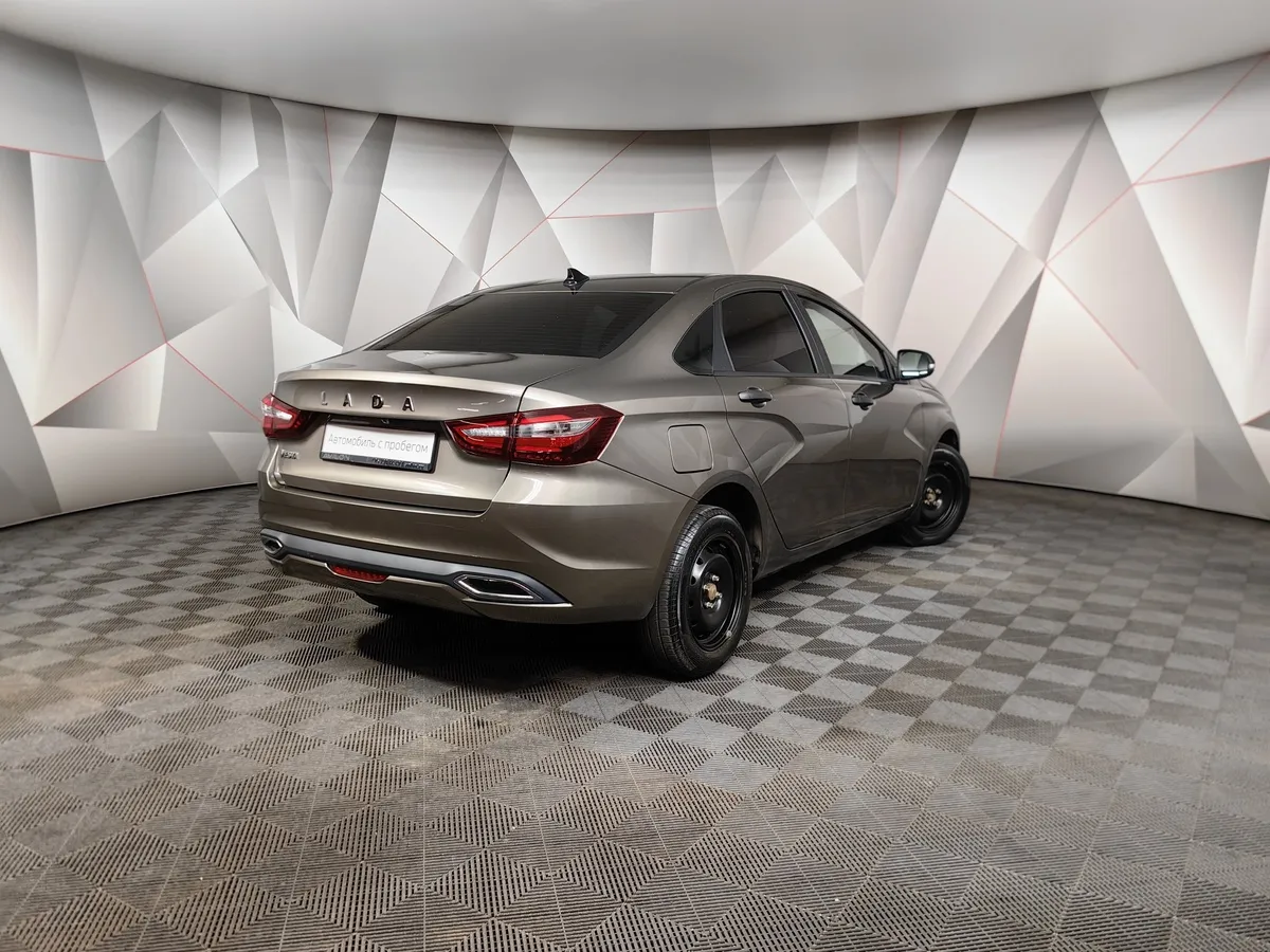 ВАЗ (Lada) Vesta 1.6 CVT (106 л.с.) Коричневый в АВИЛОН. Слайд №2