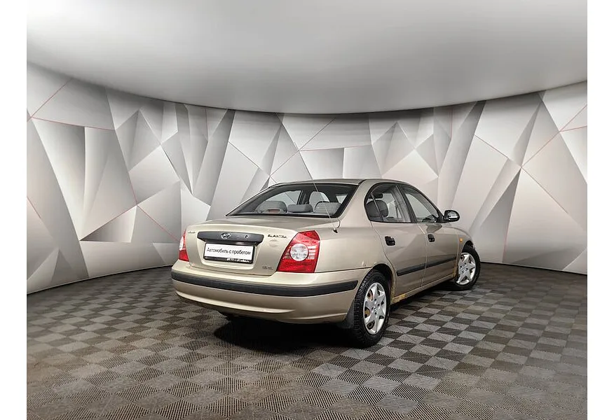 Hyundai Elantra 1.6 MT (105 л.с.) Бежевый в АВИЛОН. Слайд №2