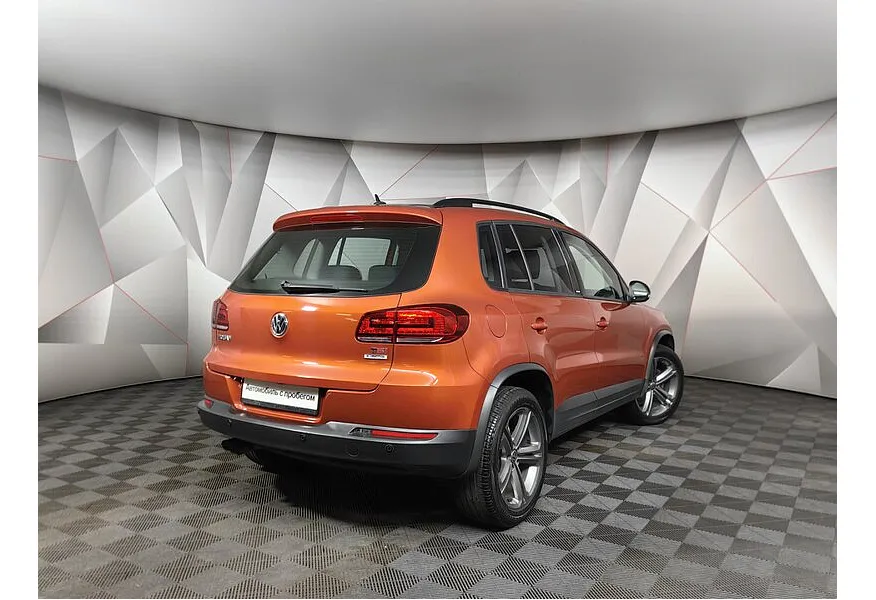 АВИЛОН - Volkswagen Tiguan 1.4 TSI BlueMotion DSG (150 л.с.) Sport&Style Оранжевый - slide 6
