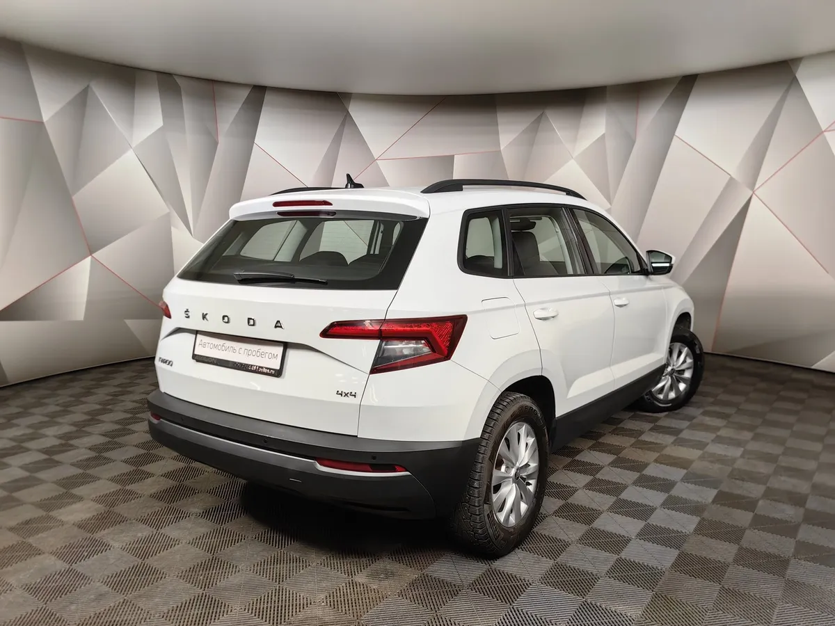 Skoda Karoq 1.4 AMT AWD (150 л.с.) Ambition Белый в АВИЛОН. Слайд №2