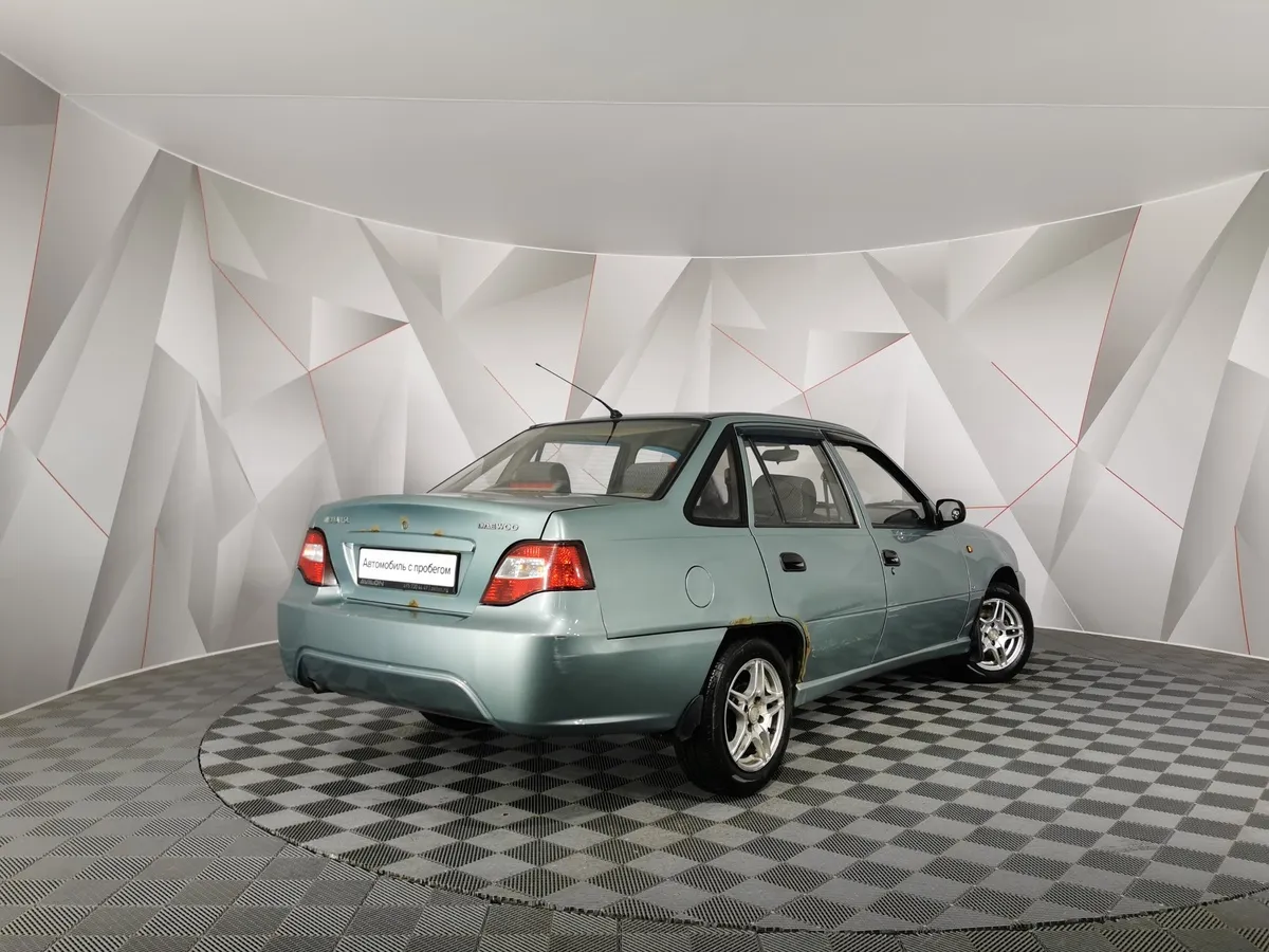Daewoo Nexia 1.6 MT (109 л.с.) Зеленый в АВИЛОН. Слайд №2