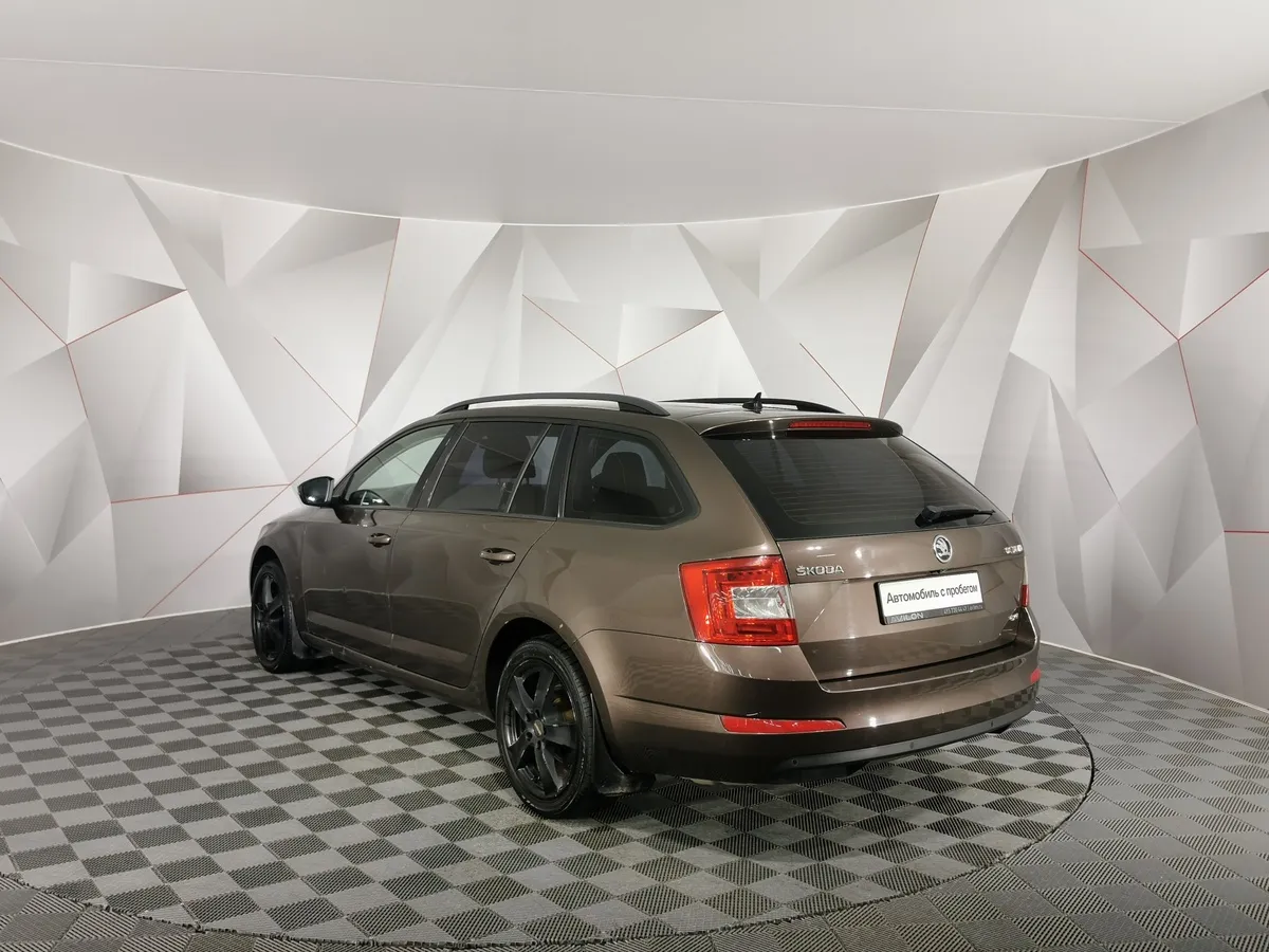 Skoda Octavia 1.8 TSI DSG 4x4 (180 л.с.) Elegance Коричневый в АВИЛОН. Слайд №4